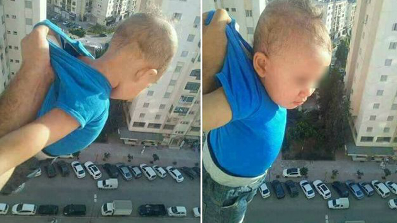 „1000 lajkov, inak ho pustím!“ Otec zdieľal šokujúcu fotografiu dieťaťa, ktoré držal na okne 15. poschodia